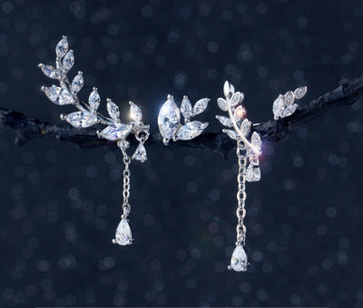 SERAPHINA | ASYMMETRIC SILVER LEAF EARRINGS