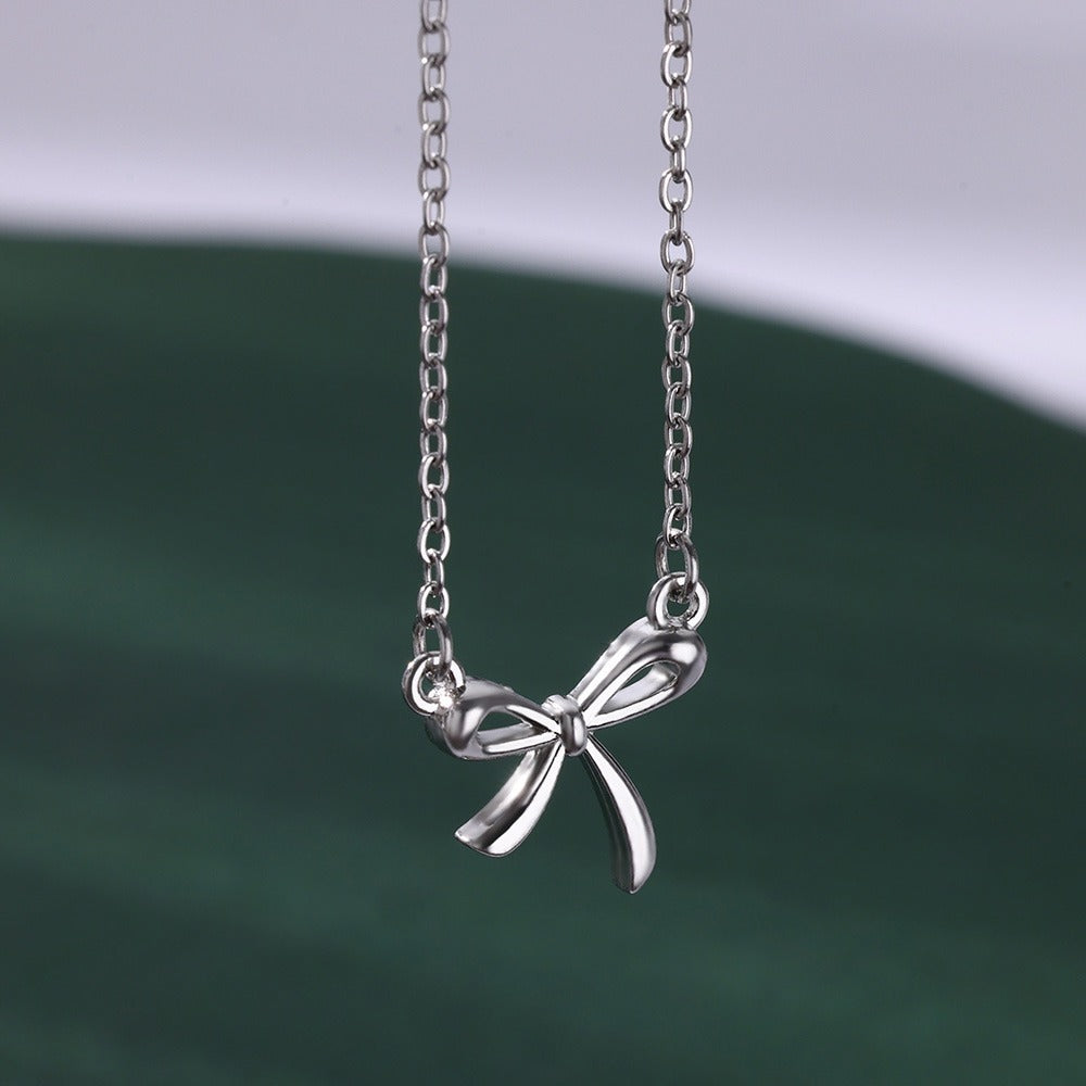 ESTELLE | BOW LOCK NECKLACE