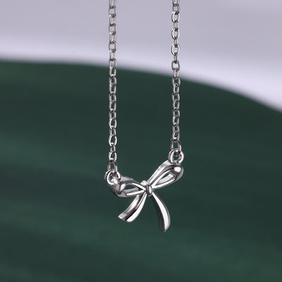 ESTELLE | BOW LOCK NECKLACE